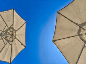 Mostly Sunny with Isolated Showers in the North, West