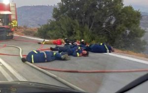 Exhausted Firefighters Rest Amid Chios Wildfire Crisis