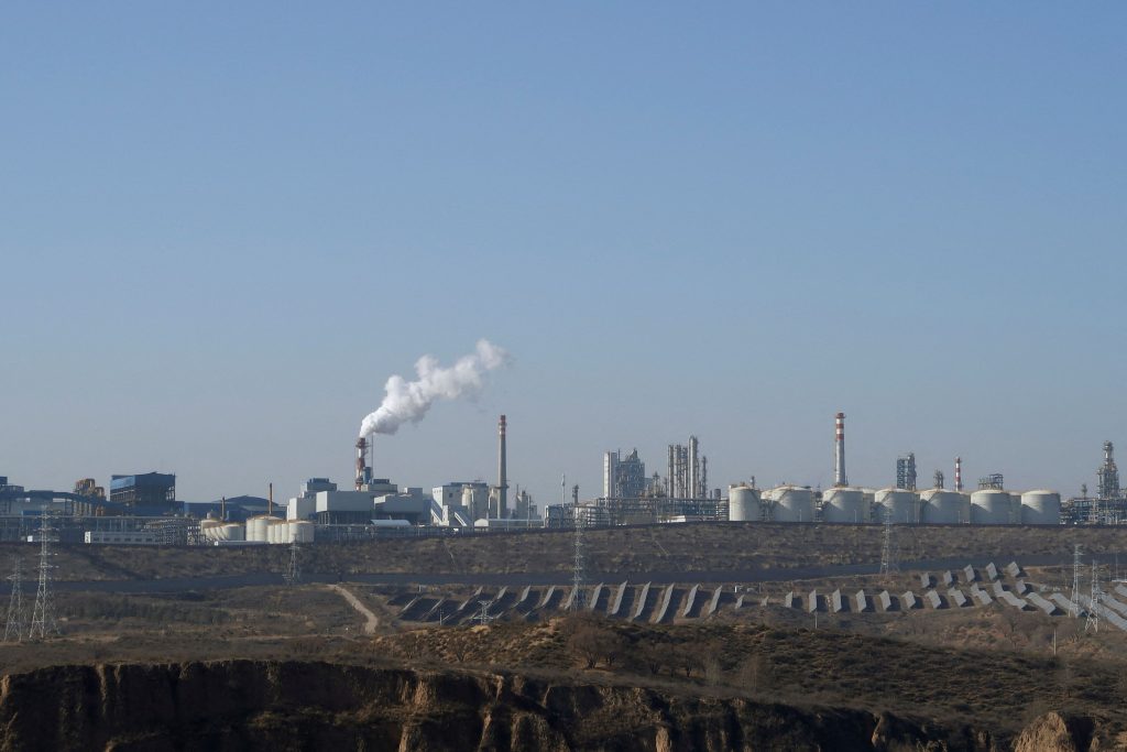 China Pledges First Emissions Cuts, Rebukes US Climate Stance