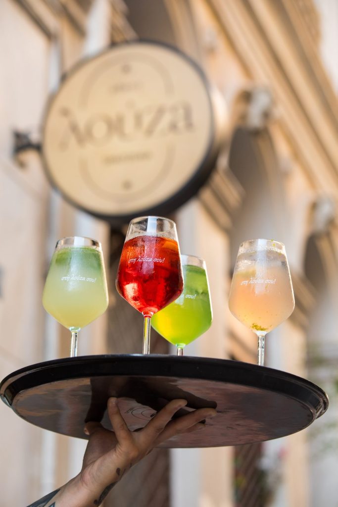 Louza Spritz & Deli in Syntagma, Athens, with colorful spritz cocktails and deli platters.