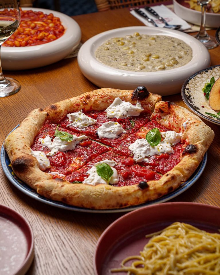 Charcuterie platters and Aperol spritzes at Cicchetti in Glyfada, Athens.