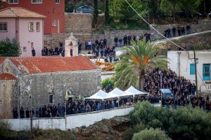 Second Funeral Held Amid Police Hunt After Crete Shootout