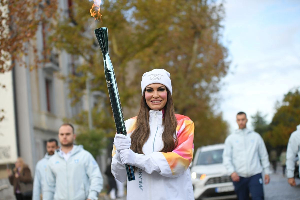 U.S. Ambassador Takes Center Stage in Olympic Flame Ceremony in Athens