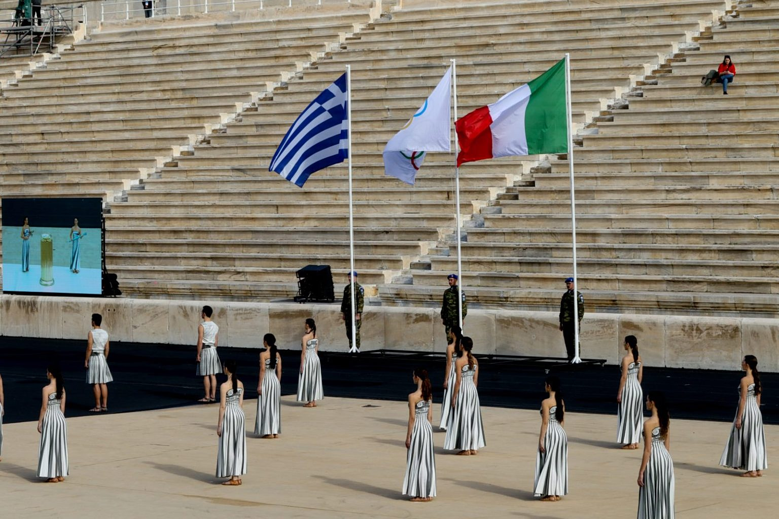 Olympic Flame Handed Over to Italy for 2026 Winter Games