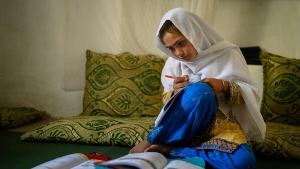 Afghan Girl Reads Before Taliban Block Her Education – UNICEF’s Photo of the Year