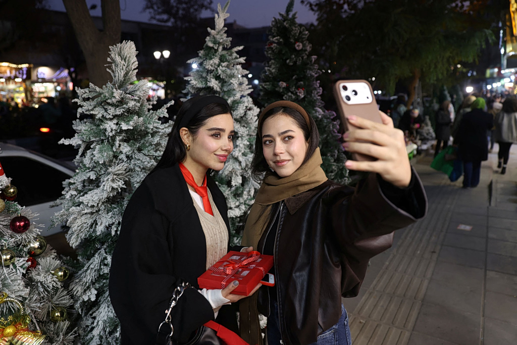 Iran Eases Social Rules Amid Crises—but Crushes Dissent