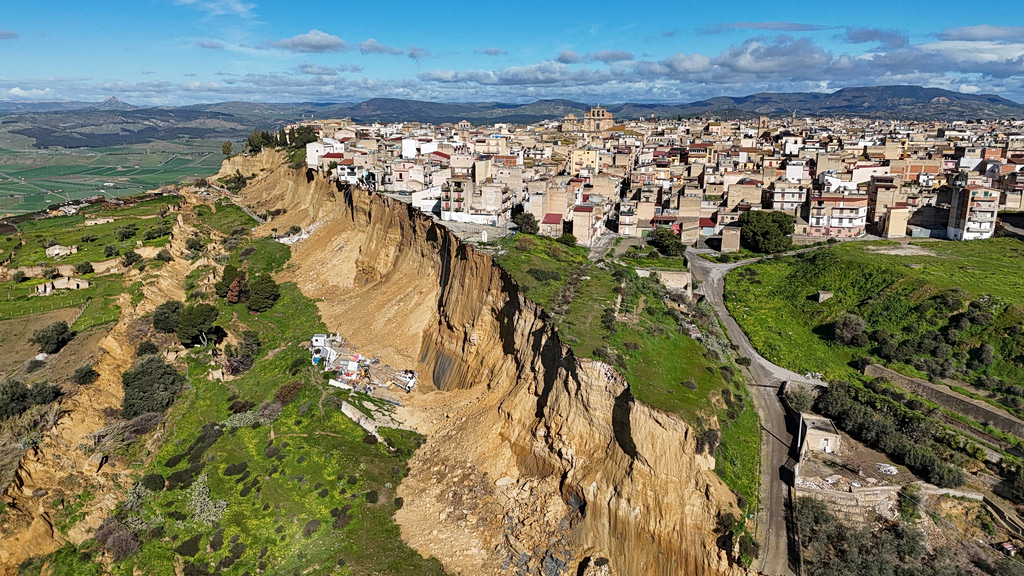 Storm-Triggered Landslide Leaves Sicilian Town Homes Hanging Over Cliff