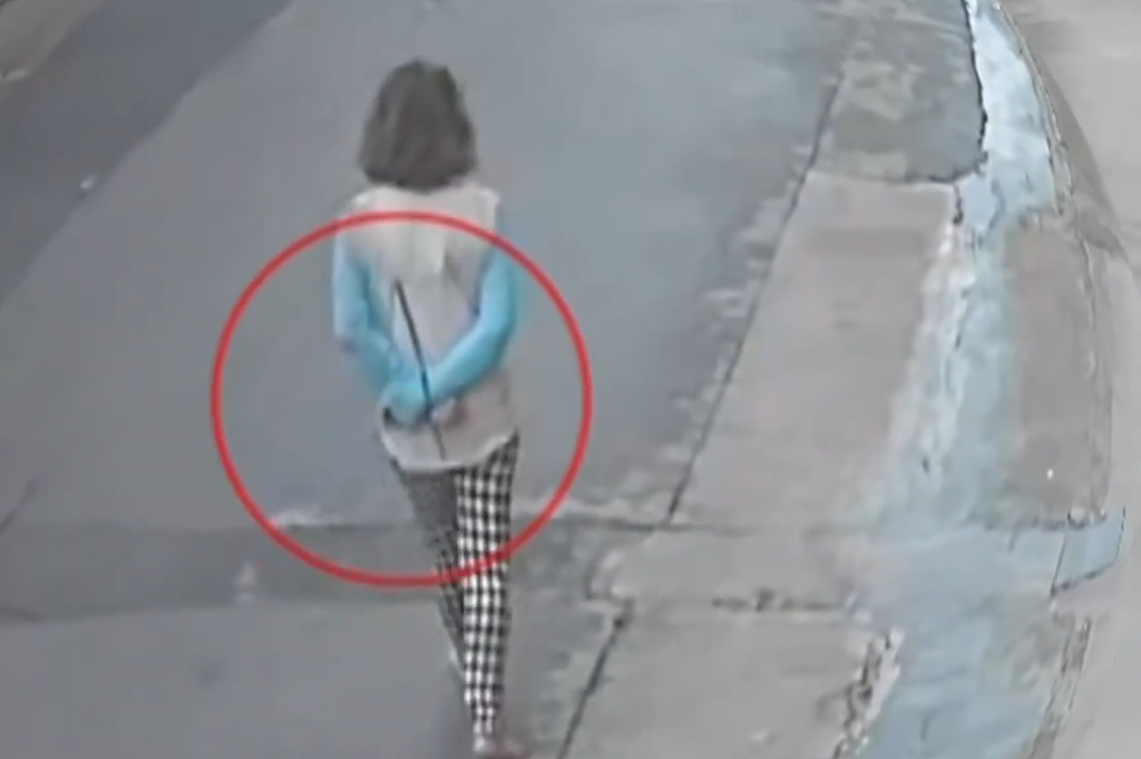Shocking Vid Shows Woman Bound, Walking Barefoot
