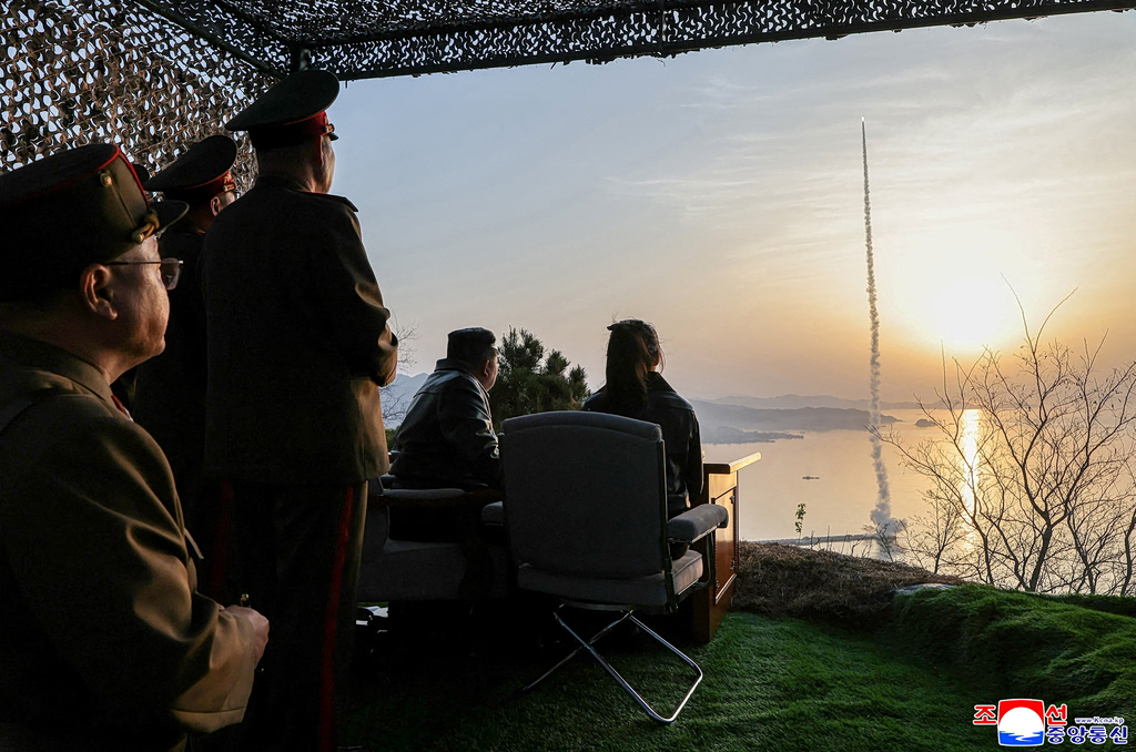 Kim Jong Un Oversees Missile Tests with Cluster Warheads