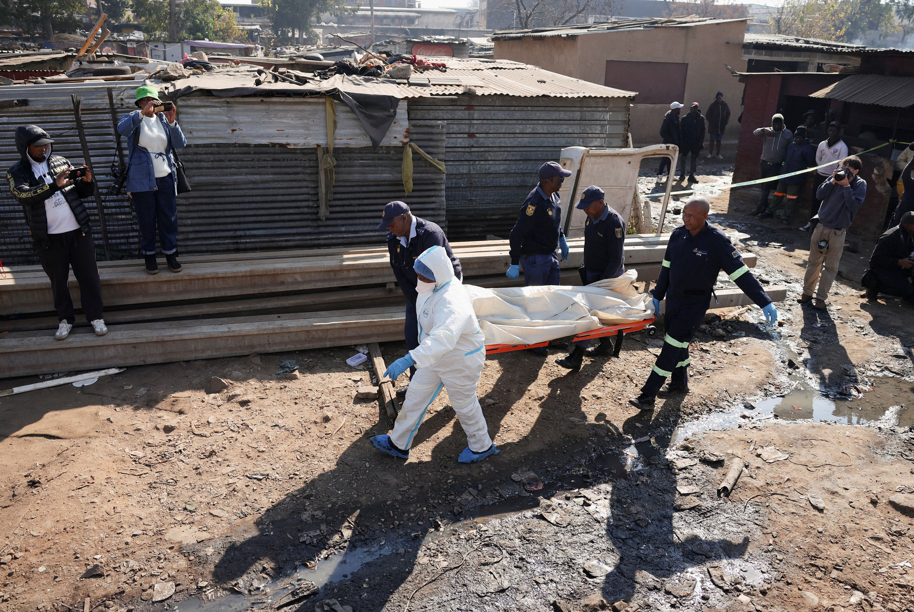 Gunmen Open Fire in Johannesburg Settlement, Killing 12
