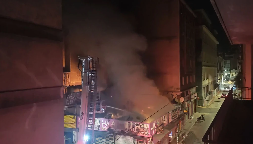 Fire Destroys Mobile Phone Store in Central Athens