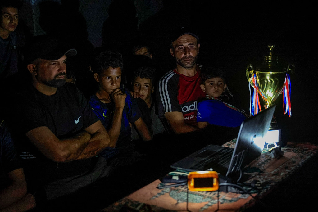 Gazans Displaced by War Watch World Cup from Ruins