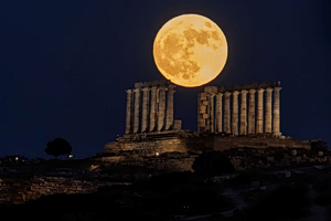 In Pictures: Strawberry Moon Illuminates Greece in Spectacular Display