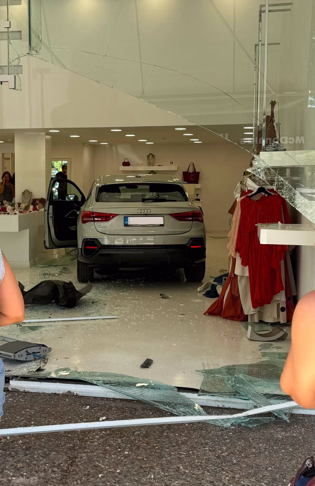 Car Crashes Into Clothing Store in Athens Suburb