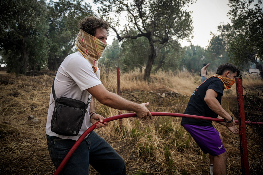 New Wildfires Break Out Overnight; Battle on Crete Intensifies
