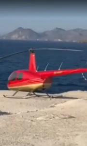 Helicopter Lands on Protected Milos Beach, Pilot Summoned by Authorities