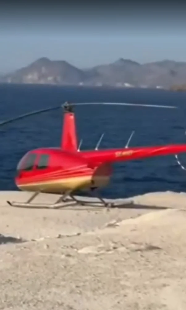 Helicopter Lands on Protected Milos Beach, Pilot Summoned by Authorities
