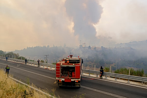 Charred Body Found Inside Car as Fire Burns Near Athens