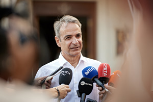 Mitsotakis Hails Early Debt Repayment as National Triumph