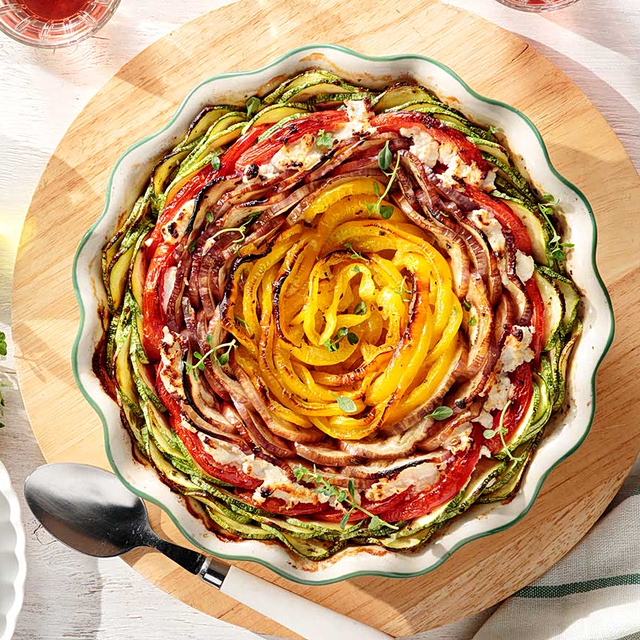 Zucchini and Eggplant Baked with Tomatoes and Sour Mizithra