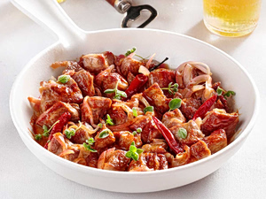 Pan-Fried Pork Neck with Onions, Lemon, and Oregano