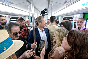 Mitsotakis Rides Refurbished Athens Line 1 Train, Two Years Overdue