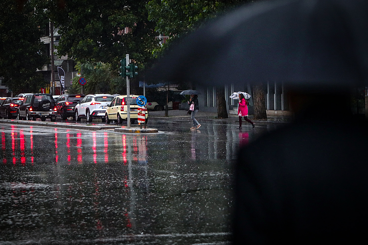 Storm Batters Greece as Rivers Overflow and Roads Flood