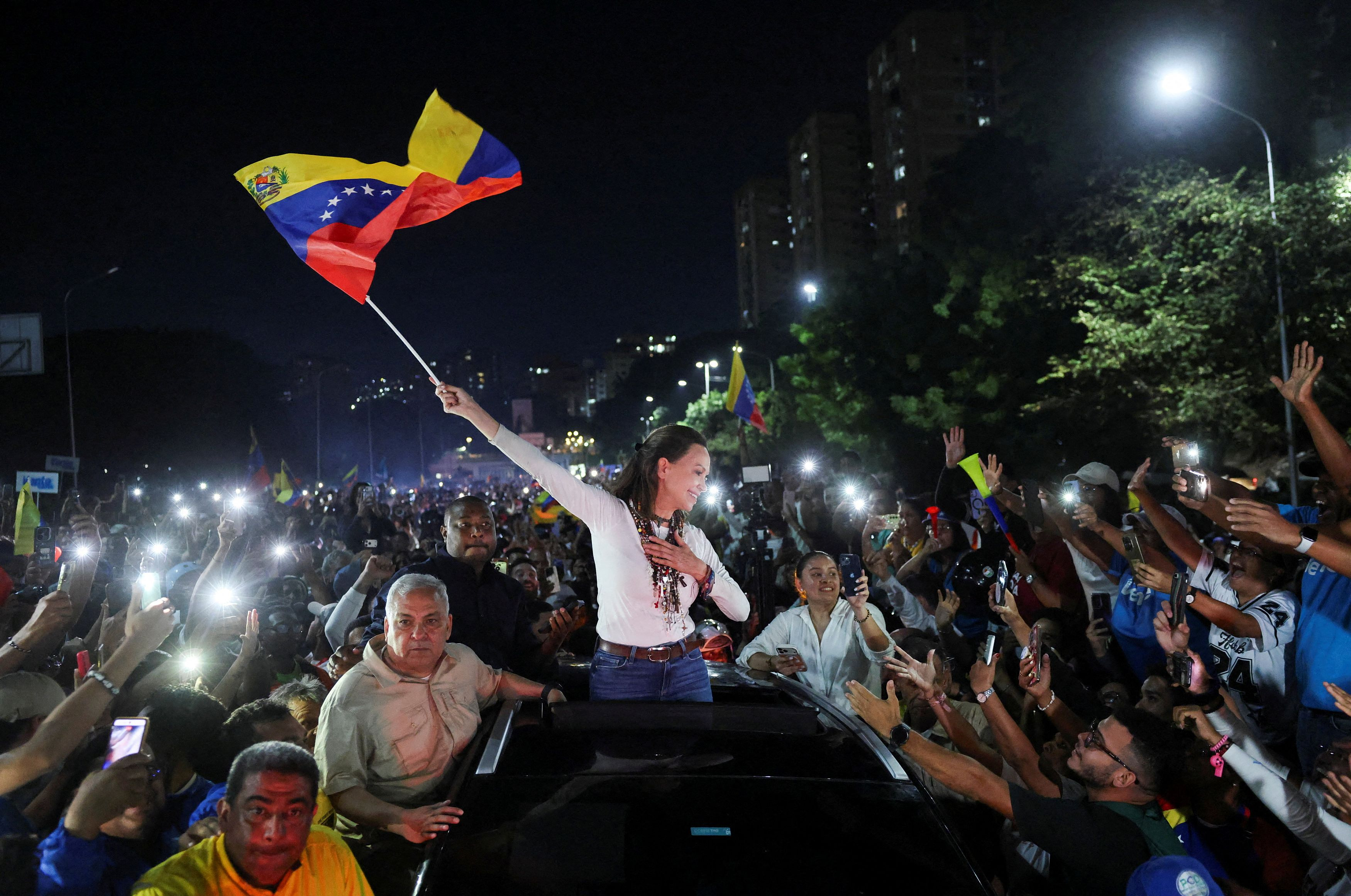 Venezuela’s Machado Returns Home, Challenging U.S.-Backed Government